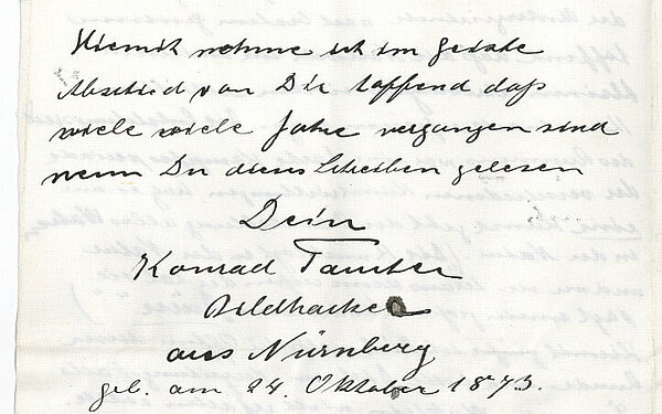 Rückseite der Urkunde zur Erinnerung an die Grundsteinlegung des Brunnens